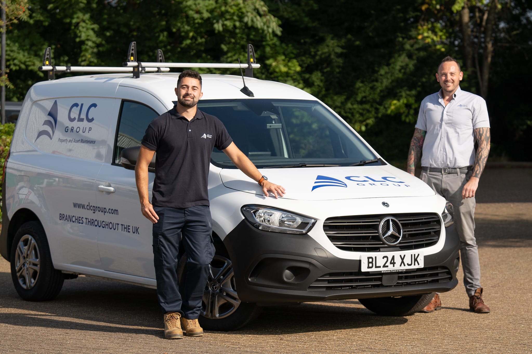 CLC Subcontractor & Manager standing besides the CLC service van
