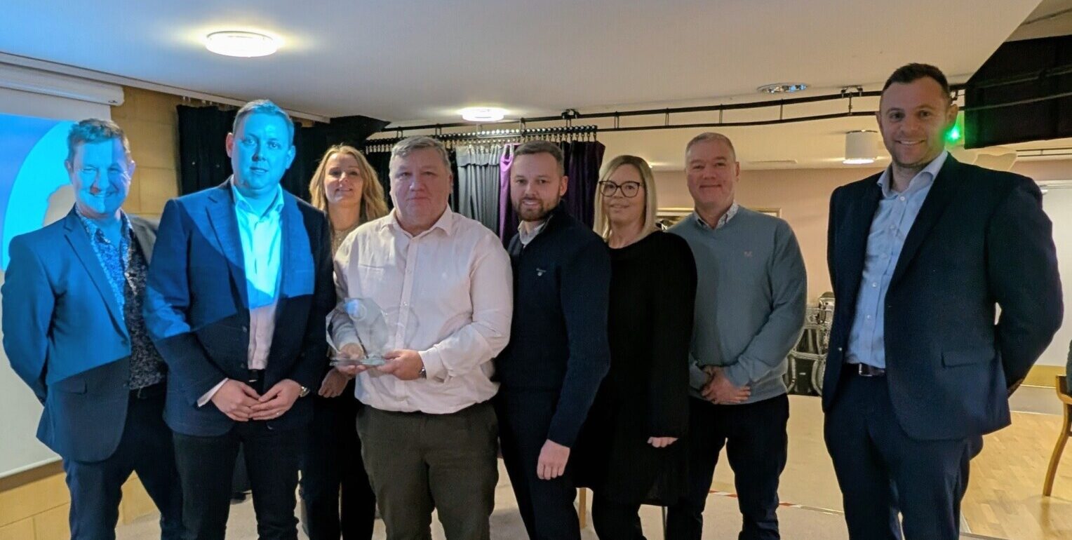 CLC team accepting their Housing 21 Award