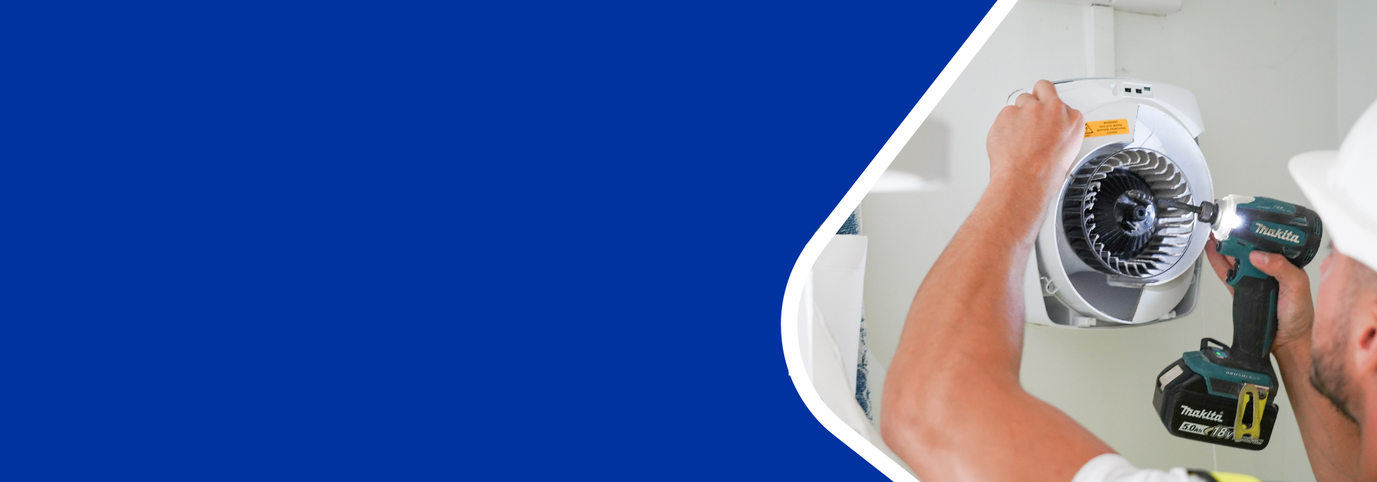 Man installing ventilation system