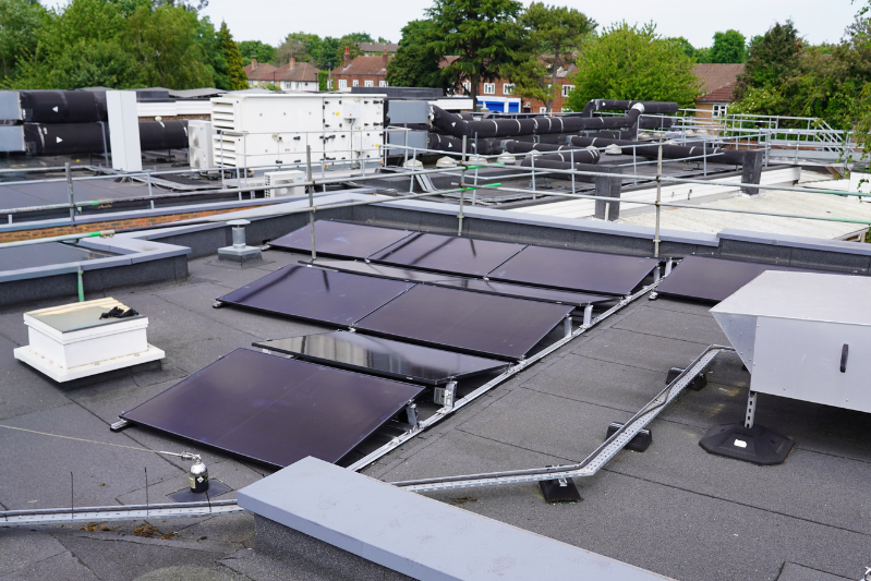 solar panels on grey asphalt roof